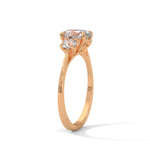 Oval and Round Brilliant Cut Lab-Grown Diamond Three-Stone Engagement Ring in Rose Gold