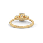 Oval and Round Brilliant Cut Lab-Grown Diamond Three-Stone Engagement Ring in Yellow Gold