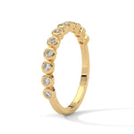 Round Brilliant Cut Lab-Grown Diamond Bezel-Set Half-Eternity Ring in Yellow Gold