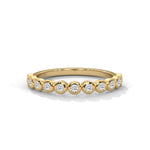 Round Brilliant Cut Lab-Grown Diamond Bezel-Set Half-Eternity Ring in Yellow Gold