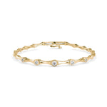 Round Brilliant Cut Lab-Grown Diamond Bezel Station Tennis Bracelet in Yellow Gold