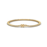 Round Brilliant Cut Lab-Grown Diamond Starburst Tennis Bracelet in Yellow Gold
