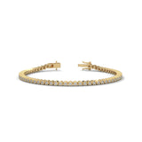 Round Brilliant Cut Lab-Grown Diamond Starburst Tennis Bracelet in Yellow Gold