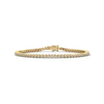 Round Brilliant Cut Lab-Grown Diamond Starburst Tennis Bracelet in Yellow Gold