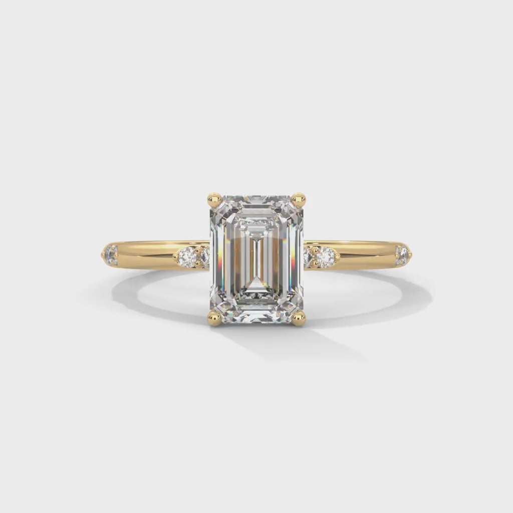 Emerald Cut Lab-Grown Diamond Solitaire Engagement Ring with Side Accents in Yellow Gold