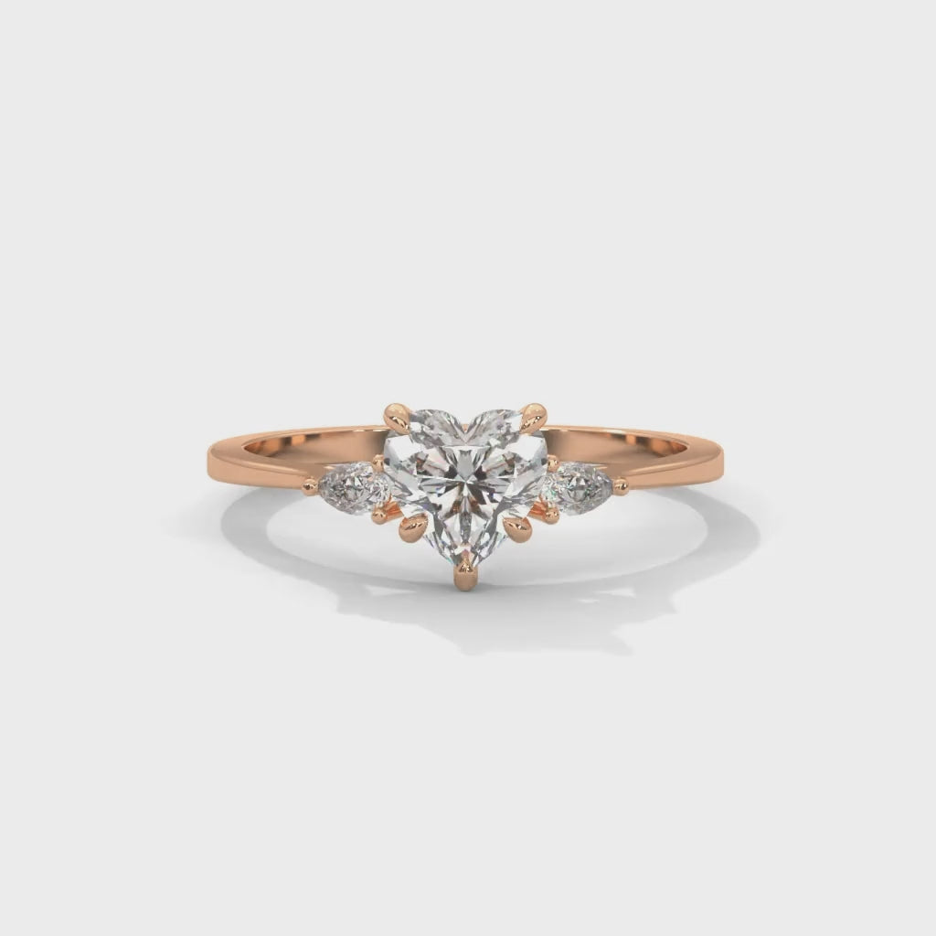 Heart and Pear-Shaped Lab-Grown Diamond Three-Stone Engagement Ring in Rose Gold