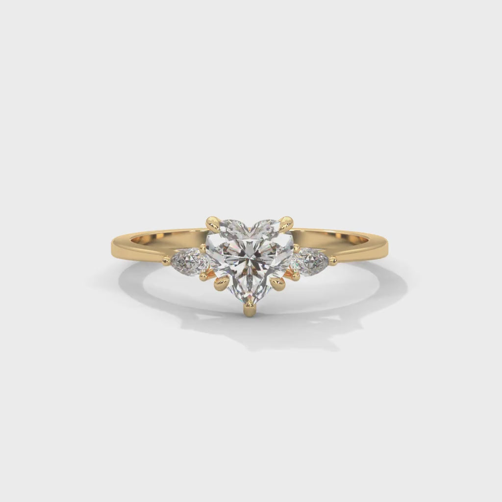Heart and Pear-Shaped Lab-Grown Diamond Three-Stone Engagement Ring in Yellow Gold