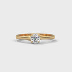 Round Brilliant Cut Lab-Grown Diamond Crossover Solitaire Engagement Ring in Yellow Gold